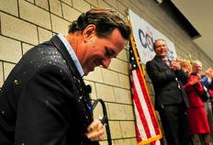No seu reduto em Minnesota, Santorum celebra vitória com chuva de confetes (GETTY IMAGES/AFP/Ben Garvin)