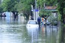 Ruas alagadas e casas destruídas pelo granizo (Agencia RBS/Ronaldo Bernardi)