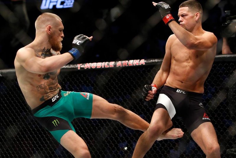 UFC 202: Diaz v McGregor 2

LAS VEGAS, NV - AUGUST 20: Conor McGregor (L) kicks Nate Diaz during their welterweight rematch at the UFC 202 event at T-Mobile Arena on August 20, 2016 in Las Vegas, Nevada.   Steve Marcus/Getty Images/AFP

Editoria: SPO
Local: Las Vegas
Indexador: Steve Marcus
Fonte: GETTY IMAGES NORTH AMERICA
Fotógrafo: STR