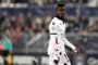 Nices Italian forward Mario Balotelli looks on during the French Ligue 1 football match between Bordeaux and Nice on December 21, 2016 at the Matmut Atlantique stadium in Bordeaux, southwestern France. NICOLAS TUCAT / AFP