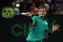 KEY BISCAYNE, FL - MARCH 31: Nick Kyrgios of Australia in action against Roger Federer of Switzerland in the semi finals at Crandon Park Tennis Center on March 31, 2017 in Key Biscayne, Florida.   Julian Finney/Getty Images/AFP