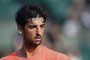  Brazils Thomaz Bellucci returns the ball to Frances Lucas Pouille during their tennis match at the Roland Garros 2017 French Open on May 31, 2017 in Paris.  / AFP PHOTO / Eric FEFERBERGEditoria: SPOLocal: ParisIndexador: ERIC FEFERBERGSecao: tennisFonte: AFPFotógrafo: STF