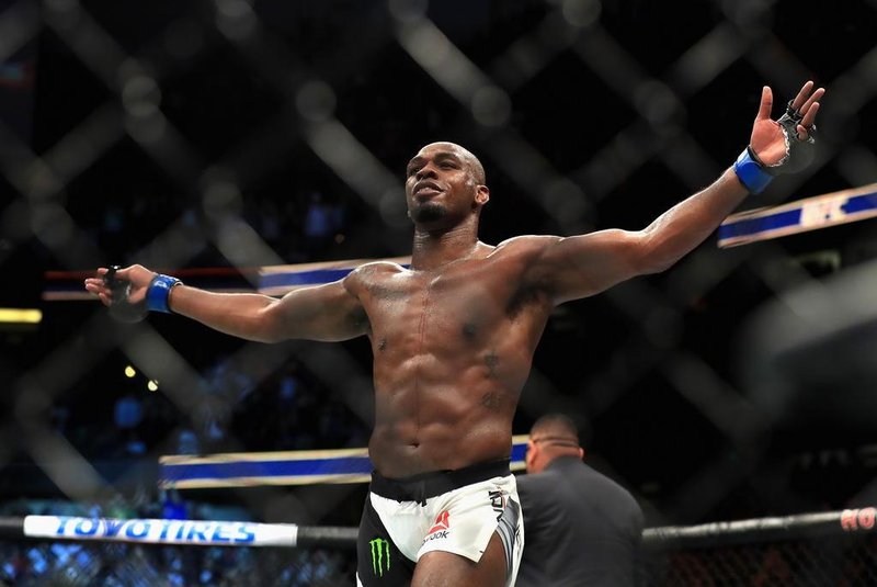 ANAHEIM, CA - JULY 29: Jon Jones reacts to defeating Daniel Cormier in the Light Heavyweight title bout during UFC 214 at Honda Center on July 29, 2017 in Anaheim, California.   Sean M. Haffey/Getty Images/AFP