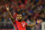 Chiles Arturo Vidal gestures during the 2018 World Cup qualifier football match against Paraguay, in Santiago, on August 31, 2017. / AFP PHOTO / Martin BERNETTI