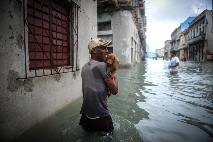 Cubans wade through a flooded street in Havana, on September 10, 2017.
Deadly Hurricane Irma battered central Cuba on Saturday, knocking down power lines, uprooting trees and ripping the roofs off homes as it headed towards Florida. Authorities said they had evacuated more than a million people as a precaution, including about 4,000 in the capital.
/ AFP PHOTO / YAMIL LAGE
Editoria: WEA
Local: Havana
Indexador: YAMIL LAGE
Secao: report
Fonte: AFP
Fotógrafo: STF
Cubans wade through a flooded street in Havana, on September 10, 2017.
Deadly Hurricane Irma battered central Cuba on Saturday, knocking down power lines, uprooting trees and ripping the roofs off homes as it headed towards Florida. Authorities said they had evacuated more than a million people as a precaution, including about 4,000 in the capital.
/ AFP PHOTO / YAMIL LAGE
Editoria: WEA
Local: Havana
Indexador: YAMIL LAGE
Secao: report
Fonte: AFP
Fotógrafo: STF