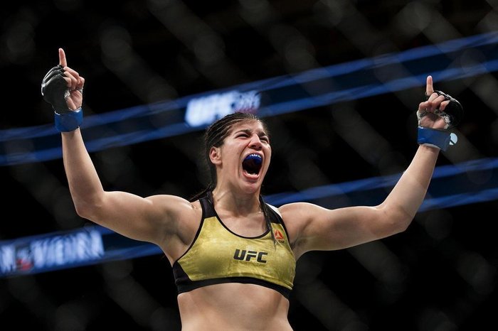 EDMONTON, AB - SEPTEMBER 09: Ketlen Vieira celebrates her victory against Sara McMann during UFC 215 at Rogers Place on September 9, 2017 in Edmonton, Canada. Codie McLachlan/Getty Images/AFP EDMONTON, AB - SEPTEMBER 09: Ketlen Vieira celebrates her victory against Sara McMann during UFC 215 at Rogers Place on September 9, 2017 in Edmonton, Canada. Codie McLachlan/Getty Images/AFP