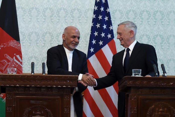 US Defense Secretary Jim Mattis (R) shakes hands with Afghan President Ashraf Ghani after a press conference at the Presidential Palace in Kabul on September 27, 2017.
US Defense Secretary Jim Mattis and NATO chief Jens Stoltenberg renewed their commitment to Afghanistan on September 27, as the Taliban launched a rocket attack that wounded five civilians in Kabul. / AFP PHOTO / WAKIL KOHSAR US Defense Secretary Jim Mattis (R) shakes hands with Afghan President Ashraf Ghani after a press conference at the Presidential Palace in Kabul on September 27, 2017.
US Defense Secretary Jim Mattis and NATO chief Jens Stoltenberg renewed their commitment to Afghanistan on September 27, as the Taliban launched a rocket attack that wounded five civilians in Kabul. / AFP PHOTO / WAKIL KOHSAR