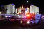 LAS VEGAS, NV - OCTOBER 02: An ambulance leaves the intersection of Las Vegas Boulevard and Tropicana Ave. after a mass shooting at a country music festival nearby on October 2, 2017 in Las Vegas, Nevada. A gunman has opened fire on a music festival in Las Vegas, leaving at least 20 people dead and more than 100 injured. Police have confirmed that one suspect has been shot. The investigation is ongoing.   Ethan Miller/Getty Images/AFP