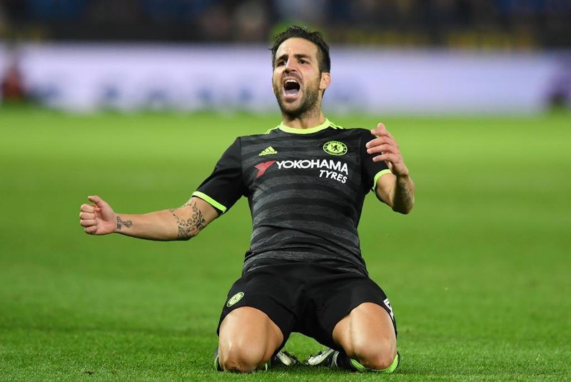 Chelseas Spanish midfielder Cesc Fábregas celebrates scoring their fourth goal during extra-time in the English League Cup third round football match between Leicester City and Chelsea at King Power Stadium in Leicester, central England on September 20, 2016. 
Anthony DEVLIN / AFP