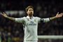  Real Madrid's defender Sergio Ramos celebrates after scoring a goal during the Spanish league footbal match Real Madrid CF vs Real Betis at the Santiago Bernabeu stadium in Madrid on March 12, 2017. / AFP PHOTO / GERARD JULIENEditoria: SPOLocal: MadridIndexador: GERARD JULIENSecao: soccerFonte: AFPFotógrafo: STF