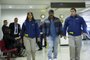 Handout picture realesed on November 9, 2017 by Chiles Investigation Police showing US former world heavyweight boxing champion Mike Tyson escorted by Chiles Investigations Police members at Santiago de Chile airport.
Tyson was detained at the airport for violating Chilean immigration laws and he will be deported to the United States.   / AFP PHOTO / CHILES INVESTIGATIONS POLICE / HO / RESTRICTED TO EDITORIAL USE - MANDATORY CREDIT AFP PHOTO / CHILES INVESTIGATIONS POLICE  - NO MARKETING - NO ADVERTISING CAMPAIGNS - DISTRIBUTED AS A SERVICE TO CLIENTS

