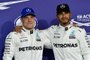  

Mercedes Finnish driver Valtteri Bottas (L) poses with his teammate British driver Lewis Hamilton at the end of the qualifying session ahead of the Abu Dhabi Formula One Grand Prix at the Yas Marina circuit on November 25, 2017.
Bottas claimed pole position for Sundays season-ending Abu Dhabi Grand Prix after coming fastest in Saturdays qualifying session at the Yas Marina circuit.
The Finn, who could yet snatch second place in the standings from Sebastian Vettel, will start ahead of his Mercedes teammate, world champion Lewis Hamilton, at the front of the grid. / AFP PHOTO / GIUSEPPE CACACE

Editoria: SPO
Local: Abu Dhabi
Indexador: GIUSEPPE CACACE
Secao: motor racing
Fonte: AFP
Fotógrafo: STF
