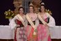 Soberanas da La Prima Vendemmia, de Nova Roma do Sul. No centro, a rainha Gabriele Calabria; de vestido rosa é princesa Laís Barea e de vestido vermelho escuro (à direita), a princesa Fernanda Zatti