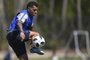 Argentine footballer Carlos Tevez takes part in a training session at Los Cardales, Buenos Aires province, on January 9, 2018. Former Manchester United and Juventus striker Carlos Tevez agreed a move back to boyhood club Boca Juniors for the third time in his carreer. / AFP PHOTO / EITAN ABRAMOVICH