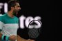 Croatia's Marin Cilic reacts after a point against Spain's Rafael Nadal during their men's singles quarter-finals match on day nine of the Australian Open tennis tournament in Melbourne on January 23, 2018. / AFP PHOTO / Paul Crock / -- IMAGE RESTRICTED TO EDITORIAL USE - STRICTLY NO COMMERCIAL USE --