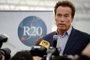 Geneva : Former Governor of California and Founding Chair of the R20 Regions of Climate Action organization, Arnold Schwarzenegger, delivers a speech during his visit to the Geneva International Motor Shows Green Pavilion on March 8, 2012 in Geneva. The R20 is a non-profit organization working with sub national governments to implement low-carbon economic  AFP PHOTO / FABRICE COFFRINI 
