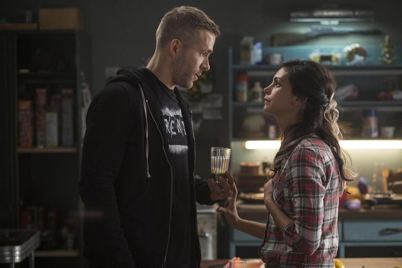 DEADPOOLWade Wilson (Ryan Reyonlds) and new squeeze Vanessa (Morena Baccarin) trade some pointed barbs, in DEADPOOL.Photo Credit: Joe LedererTM & Â© 2015 Marvel & Subs. Â TM and Â© 2015 Twentieth Century Fox Film Corporation. Â All rights reserved. Â Not for sale or duplication.