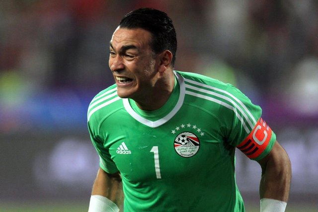 Egypts Essam El-Hadary celebrates wining against Congos team during their World Cup 2018 Africa qualifying match between Egypt and Congo at the Borg el-Arab stadium in Alexandria on October 8, 2017.Liverpool striker Mohamed Salah converted a stoppage-time penalty to give Egypt a dramatic 2-1 win over Congo Brazzaville Sunday and a place at the 2018 World Cup in Russia. / AFP PHOTO / TAREK ABDEL HAMID Egypts Essam El-Hadary celebrates wining against Congos team during their World Cup 2018 Africa qualifying match between Egypt and Congo at the Borg el-Arab stadium in Alexandria on October 8, 2017.Liverpool striker Mohamed Salah converted a stoppage-time penalty to give Egypt a dramatic 2-1 win over Congo Brazzaville Sunday and a place at the 2018 World Cup in Russia. / AFP PHOTO / TAREK ABDEL HAMID