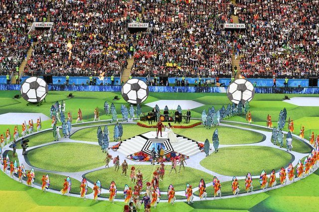 Actors perform during the Opening Ceremony before the Russia 2018 World Cup Group A football match between Russia and Saudi Arabia at the Luzhniki Stadium in Moscow on June 14, 2018. / AFP PHOTO / Mladen ANTONOV / RESTRICTED TO EDITORIAL USE - NO MOBILE PUSH ALERTS/DOWNLOADSEditoria: SPOLocal: MoscowIndexador: MLADEN ANTONOVSecao: soccerFonte: AFPFotógrafo: STF Actors perform during the Opening Ceremony before the Russia 2018 World Cup Group A football match between Russia and Saudi Arabia at the Luzhniki Stadium in Moscow on June 14, 2018. / AFP PHOTO / Mladen ANTONOV / RESTRICTED TO EDITORIAL USE - NO MOBILE PUSH ALERTS/DOWNLOADSEditoria: SPOLocal: MoscowIndexador: MLADEN ANTONOVSecao: soccerFonte: AFPFotógrafo: STF