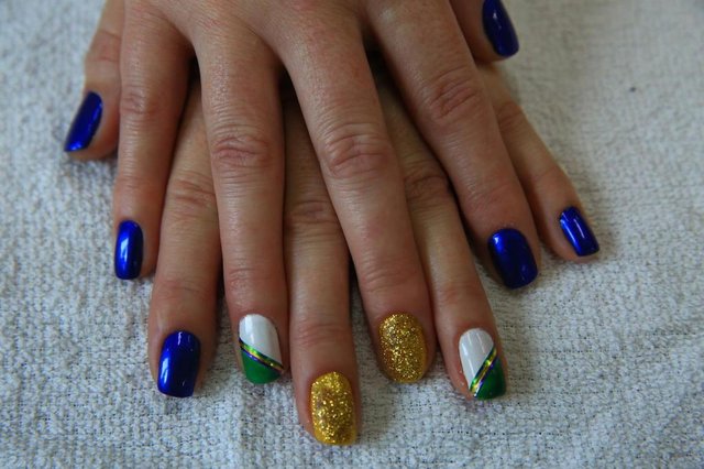 PORTO ALEGRE, RS, BRASIL, 12/06/2018 - Unhas decoradas para a Copa. Mostra será realizada no Senac do Centro Histórico, ministrado pelas professoras do curso de manicure. (FOTOGRAFO: TADEU VILANI / AGENCIA RBS) PORTO ALEGRE, RS, BRASIL, 12/06/2018 - Unhas decoradas para a Copa. Mostra será realizada no Senac do Centro Histórico, ministrado pelas professoras do curso de manicure. (FOTOGRAFO: TADEU VILANI / AGENCIA RBS)