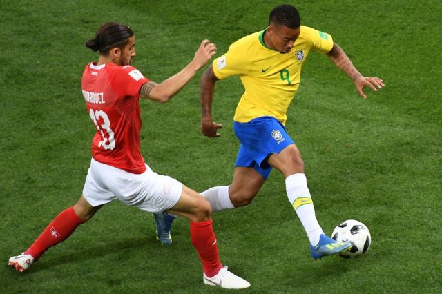 Switzerlands defender Ricardo Rodriguez (L) vies with Brazils forward Gabriel Jesus during the Russia 2018 World Cup Group E football match between Brazil and Switzerland at the Rostov Arena in Rostov-On-Don on June 17, 2018. / AFP PHOTO / KHALED DESOUKI / RESTRICTED TO EDITORIAL USE - NO MOBILE PUSH ALERTS/DOWNLOADSEditoria: SPOLocal: Rostov-on-DonIndexador: KHALED DESOUKISecao: soccerFonte: AFPFotógrafo: STF Switzerlands defender Ricardo Rodriguez (L) vies with Brazils forward Gabriel Jesus during the Russia 2018 World Cup Group E football match between Brazil and Switzerland at the Rostov Arena in Rostov-On-Don on June 17, 2018. / AFP PHOTO / KHALED DESOUKI / RESTRICTED TO EDITORIAL USE - NO MOBILE PUSH ALERTS/DOWNLOADSEditoria: SPOLocal: Rostov-on-DonIndexador: KHALED DESOUKISecao: soccerFonte: AFPFotógrafo: STF