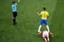 Referee Cesar Ramos (L) shows a yellow card to Brazils midfielder Casemiro during the Russia 2018 World Cup Group E football match between Brazil and Switzerland at the Rostov Arena in Rostov-On-Don on June 17, 2018. / AFP PHOTO / KHALED DESOUKI / RESTRICTED TO EDITORIAL USE - NO MOBILE PUSH ALERTS/DOWNLOADS