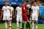  Portugals forward Cristiano Ronaldo (2nd-R) kisses the ball before taking a penalty during the Russia 2018 World Cup Group B football match between Iran and Portugal at the Mordovia Arena in Saransk on June 25, 2018. / AFP PHOTO / JUAN BARRETO / RESTRICTED TO EDITORIAL USE - NO MOBILE PUSH ALERTS/DOWNLOADSEditoria: SPOLocal: SaranskIndexador: JUAN BARRETOSecao: soccerFonte: AFPFotógrafo: STF