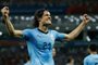 Uruguays forward Edinson Cavani celebrates after giving his team the lead with his second goal during the Russia 2018 World Cup round of 16 football match between Uruguay and Portugal at the Fisht Stadium in Sochi on June 30, 2018. / AFP PHOTO / Odd ANDERSEN / RESTRICTED TO EDITORIAL USE - NO MOBILE PUSH ALERTS/DOWNLOADS