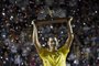 Dominic Thiem of Autria celebrates after winning the final match against Spanish Pablo Carreno Busta, during their ATP World Tour 500 Rio Open final single tennis match at the Jockey Club in Rio de Janeiro, Brazil on February 26, 2017. Thiem won the final by 7-5, 6-4. / AFP PHOTO / J.P.ENGELBRECHT