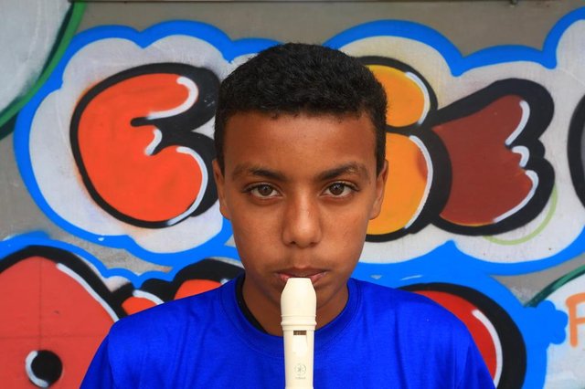 PORTO ALEGRE -RS BR - 28.11.2018Orquestra da Pequena Casa da Criança, bairro Partenon.Luca Peres, toca flauta.FOTÓGRAFO: TADEU VILANI AGÊNCIARBS Editoria DG PORTO ALEGRE -RS BR - 28.11.2018Orquestra da Pequena Casa da Criança, bairro Partenon.Luca Peres, toca flauta.FOTÓGRAFO: TADEU VILANI AGÊNCIARBS Editoria DG