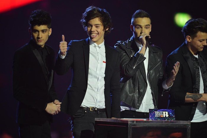 Harry Styles (à frente) é integrante do One Direction / Harry Styles (à frente) é integrante do One Direction