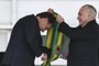  Outgoing Brazilian president Michel Temer hands over the presidential sash to Brazils new president Jair Bolsonaro at Planalto Palace in Brasilia on January 1, 2019. - Bolsonaro takes office with promises to radically change the path taken by Latin Americas biggest country by trashing decades of centre-left policies. (Photo by EVARISTO SA / AFP)Editoria: POLLocal: BrasíliaIndexador: EVARISTO SASecao: governmentFonte: AFPFotógrafo: STF