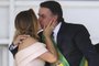  Brazils new First Lady Michelle Bolsonaro (L) kisses his husband Brazils new president Jair Bolsonaro, during his inauguration ceremony at Planalto Palace in Brasilia on January 1, 2019. - Bolsonaro takes office with promises to radically change the path taken by Latin Americas biggest country by trashing decades of centre-left policies. (Photo by EVARISTO SA / AFP)Editoria: POLLocal: BrasíliaIndexador: EVARISTO SASecao: governmentFonte: AFPFotógrafo: STF