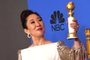 76th Annual Golden Globe Awards - Press RoomHost and Best Performance by an Actress in a Television Series – Drama for Killing Eve winner Sandra Oh poses with the trophy during the 76th annual Golden Globe Awards on January 6, 2019, at the Beverly Hilton hotel in Beverly Hills, California. (Photo by Mark RALSTON / AFP)Editoria: ACELocal: Beverly HillsIndexador: MARK RALSTONSecao: televisionFonte: AFPFotógrafo: STF