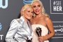 SANTA MONICA, CA - JANUARY 13: Glenn Close (L), winner of Best Actress for The Wife, and Lady Gaga, winner of Best Actress for A Star Is Born, pose in the press room during the 24th annual Critics Choice Awards at Barker Hangar on January 13, 2019 in Santa Monica, California.   Frazer Harrison/Getty Images/AFP