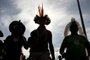 Brazilian indigenous people from several tribes take part in a demonstration against the new law of demarcation of indigenous reserves, in Brasilia on December 4, 2013. Contrary to the claims of the government, the new law perpetuates the non-demarcation of indigenous lands, in turn weakens the National Indian Foundation (FUNAI), and draws a frightening picture of exacerbation of conflicts, says a realese of the Articulation of Indigenous Peoples of Brazil (APIB), the organization that proposed the protest. AFP PHOTO / Evaristo SaEditoria: WARLocal: BrasíliaIndexador: EVARISTO SASecao: demonstrationFonte: AFPFotógrafo: STF