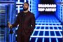 LAS VEGAS, NEVADA - MAY 01: Drake accepts the Top Artist award onstage during the 2019 Billboard Music Awards at MGM Grand Garden Arena on May 01, 2019 in Las Vegas, Nevada.   Kevin Winter/Getty Images for dcp/AFP