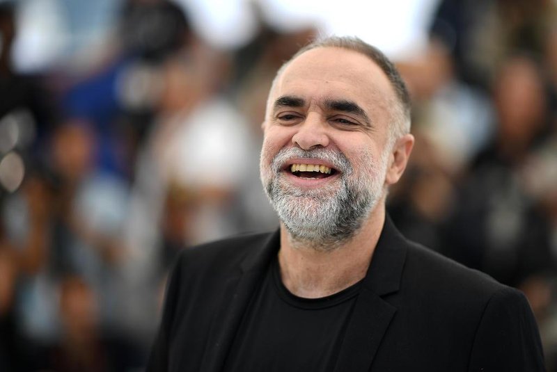 Brazilian film director Karim Ainouz poses during a photocall for the film A Vida Invisivel de Euridice Gusmao (The Invisible Life of Euridice Gusmao) at the 72nd edition of the Cannes Film Festival in Cannes, southern France, on May 20, 2019. (Photo by LOIC VENANCE / AFP)