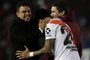  River Plates coach Marcelo Gallardo (L) celebrates with player Enzo Perez after defeating Boca Juniors 2-0 in the all-Argentine Copa Libertadores semi-final first leg football match at the Monumental stadium in Buenos Aires, on October 1, 2019. (Photo by Alejandro PAGNI / AFP)Editoria: SPOLocal: Buenos AiresIndexador: ALEJANDRO PAGNISecao: soccerFonte: AFPFotógrafo: STR