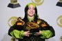 US singer-songwriter Billie Eilish poses in the press room with the awards for Album Of The Year, Record Of The Year, Best New Artist, Song Of The Year and Best Pop Vocal Album during the 62nd Annual Grammy Awards on January 26, 2020, in Los Angeles. (Photo by FREDERIC J. BROWN / AFP)<!-- NICAID(14399319) -->