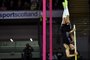 Swedens Armand Duplantis competes to clear six meters to win the mens pole vault final at the Müller Indoor Grand Prix Glasgow 2020 athletics in Glasgow on February 15, 2020. - Swedens Armand Duplantis set a world pole vault record of 6.18 metres at an indoor meeting in Glasgow on Saturday, adding one centimetre to the record he set in Poland. Duplantis, the 20-year-old who won silver at last years world championships in Doha, cleared the bar with something to spare. (Photo by ANDY BUCHANAN / AFP)<!-- NICAID(14423323) -->