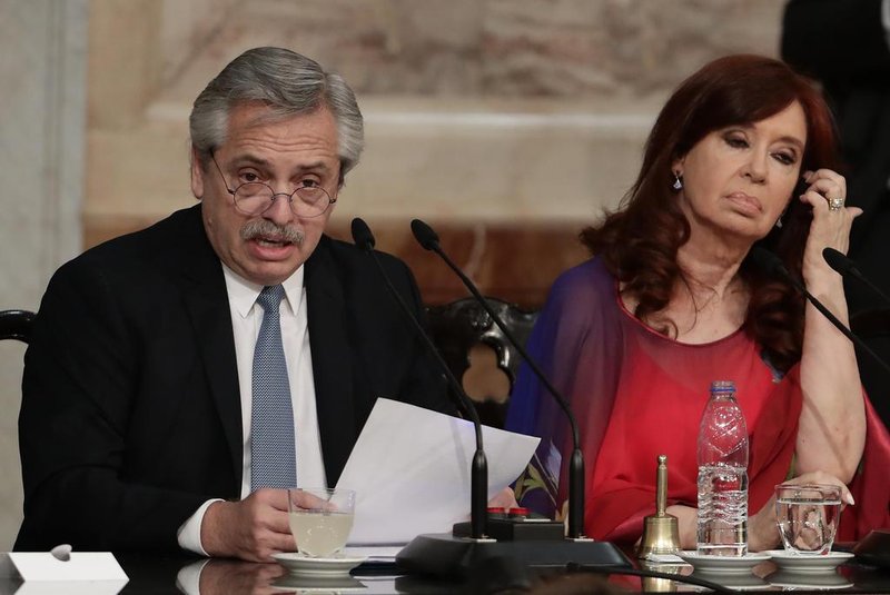 Argentine President Alberto Fernandez (L) delivers a speech, next to Vicepresident Cristina Fernandez de Kirchner, during the inauguration of the 138th period of ordinary sessions at the Congress in Buenos Aires, Argentina on March 1, 2020. (Photo by ALEJANDRO PAGNI / AFP)<!-- NICAID(14436371) -->