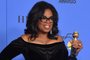 Actress and TV talk show host Oprah Winfrey poses with the Cecil B. DeMille Award during the 75th Golden Globe Awards on January 7, 2018, in Beverly Hills, California. / AFP PHOTO / Frederic J. BROWN<!-- NICAID(13355500) -->