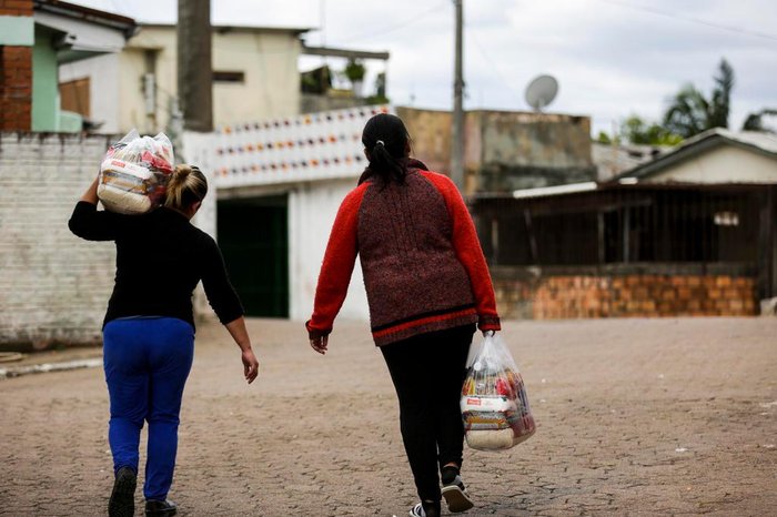 Voluntários na lida