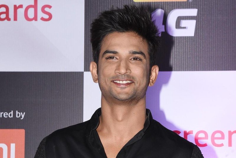 (FILES) In this file photo taken on December 16, 2018 Indian Bollywood actor Sushant Singh Rajput poses for a picture as he attends the 'Star Screen Awards' ceremony in Mumbai. - A young Bollywood heartthrob lauded for his portrayal of cricket star M.S. Dhoni on the silver screen has taken his own life, Mumbai police said on June 14, the latest in a string of deaths to rock India's entertainment industry. "Police found Sushant Singh Rajput's body at his residence Sunday afternoon," Mumbai police spokesman Pranay Ashok told AFP, confirming that the 34-year-old had taken his own life. Rajput, renowned for his numerous hits on the big and small screens, reportedly battled depression. (Photo by Sujit Jaiswal / AFP)