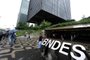 The main entrance to the state-owned Brazilian Development Bank (BNDES) in Rio de Janeiro, Brazil, on July 4, 2011. The BNDES will support the fusion of Carrefour and CBD-Pao de Acucar in Brazil only if all sides involved, included Casino, agree to do it in a "friendly" and "without litigation" way. French supermarket giants Carrefour and Casino traded further blows Monday over their operations in Brazil, a key market where both are claiming a tie-up with the same company. AFP PHOTO/VANDERLEI ALMEIDA (Photo by VANDERLEI ALMEIDA / AFP)Editoria: FINLocal: Rio de JaneiroIndexador: VANDERLEI ALMEIDASecao: company informationFonte: AFP<!-- NICAID(15346013) -->