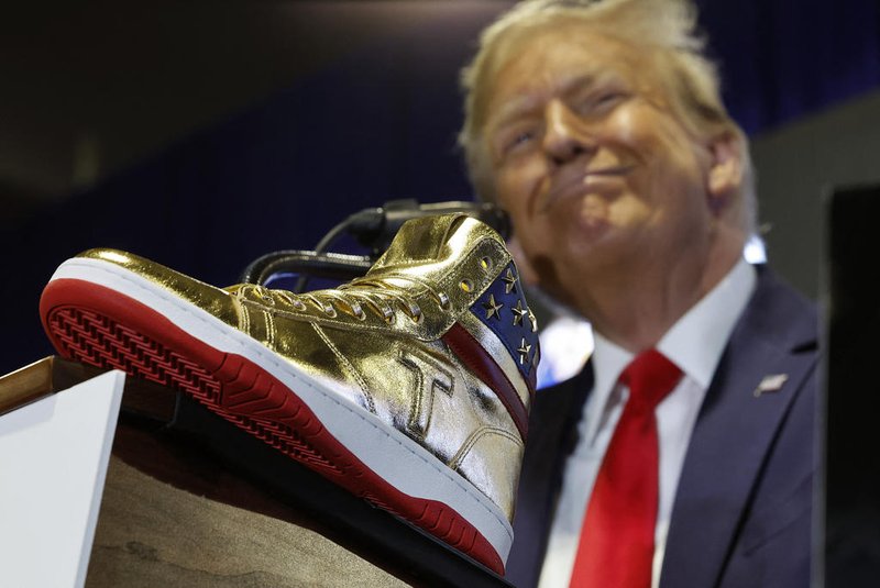 PHILADELPHIA, PENNSYLVANIA - FEBRUARY 17: Republican presidential candidate and former President Donald Trump delivers remarks while introducing a new line of signature shoes at Sneaker Con at the Philadelphia Convention Center on February 17, 2024 in Philadelphia, Pennsylvania. Sneaker Con was founded in 2009 and is one of the oldest events celebrating sneakers, streetwear and urban culture. Trump addressed the event one day after a judge ordered the former president to pay $354 million in his New York civil fraud trial.   Chip Somodevilla/Getty Images/AFP (Photo by CHIP SOMODEVILLA / GETTY IMAGES NORTH AMERICA / Getty Images via AFP)<!-- NICAID(15683394) -->