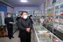 This picture taken on May 15, 2022 and released from North Korea's official Korean Central News Agency (KCNA) on May 16 shows North Korean leader Kim Jong Un (C) inspecting a pharmacy in Pyongyang. (Photo by KCNA VIA KNS / AFP) / - South Korea OUT / ---EDITORS NOTE--- RESTRICTED TO EDITORIAL USE - MANDATORY CREDIT "AFP PHOTO/KCNA VIA KNS" - NO MARKETING NO ADVERTISING CAMPAIGNS - DISTRIBUTED AS A SERVICE TO CLIENTSTHIS PICTURE WAS MADE AVAILABLE BY A THIRD PARTY. AFP CAN NOT INDEPENDENTLY VERIFY THE AUTHENTICITY, LOCATION, DATE AND CONTENT OF THIS IMAGE. / <!-- NICAID(15096895) -->