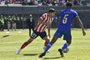 Paraguay's midfielder Mathias Villasanti (L) fights for the ball with Nicaragua's defender Erick Telez during the friendly football match between Paraguay and Nicaragua at the Defensores del Chaco stadium in Asuncion on June 18, 2023. (Photo by NORBERTO DUARTE / AFP)<!-- NICAID(15459787) -->
