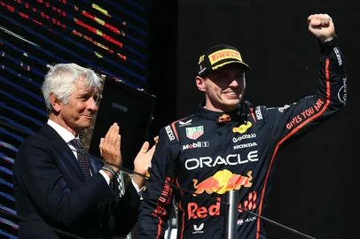 Red Bull Racing's Dutch driver Max Verstappen celebrates on the podium after winning the 2025 Emilia Romagna Formula One Grand Prix at the Imola autodrome in Imola, on May 18, 2025. (Photo by Marco BERTORELLO / AFP)<!-- NICAID(16040031) -->